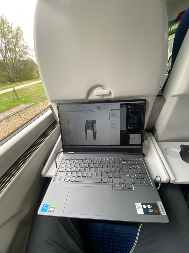 Laptop showing working while on train